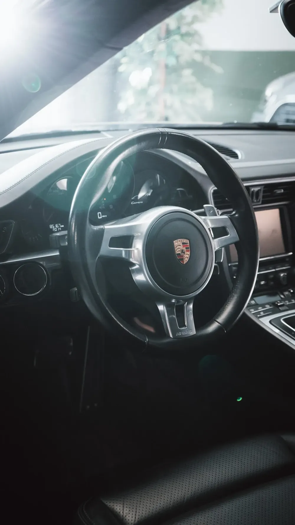Volant Porsche 911 Carrera, gros plan intérieur
